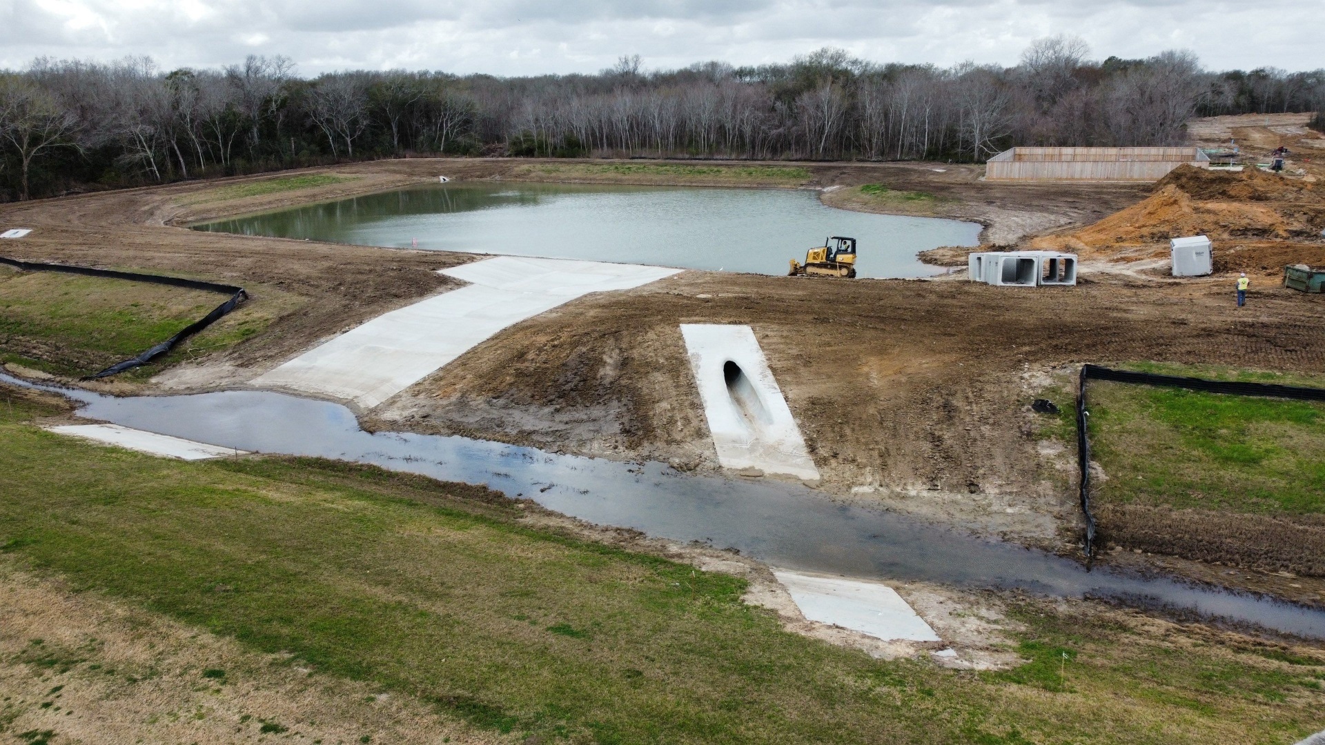 Storm water management and concrete spillway work